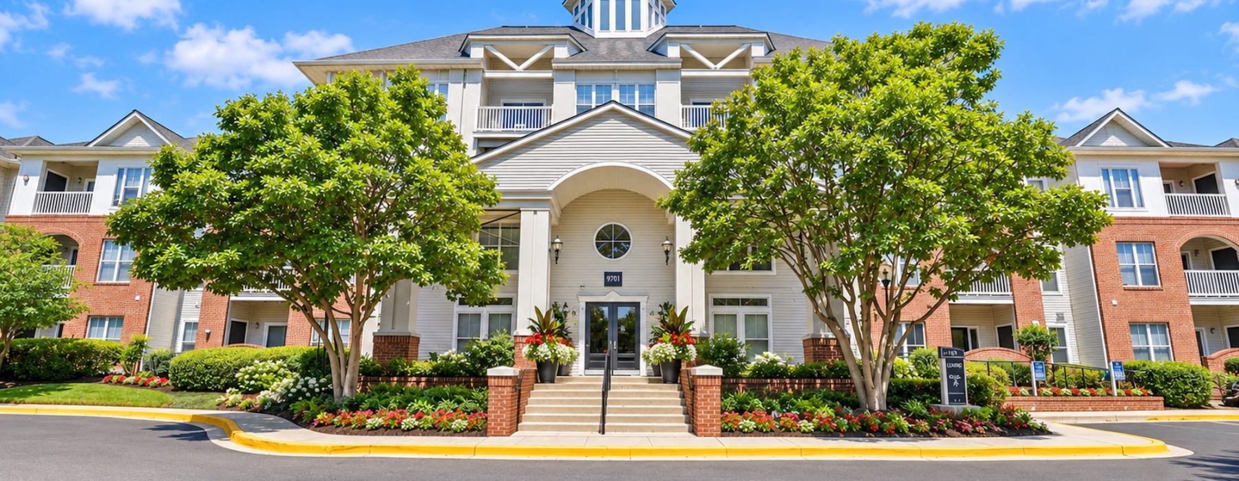 a large building with trees in front of it
