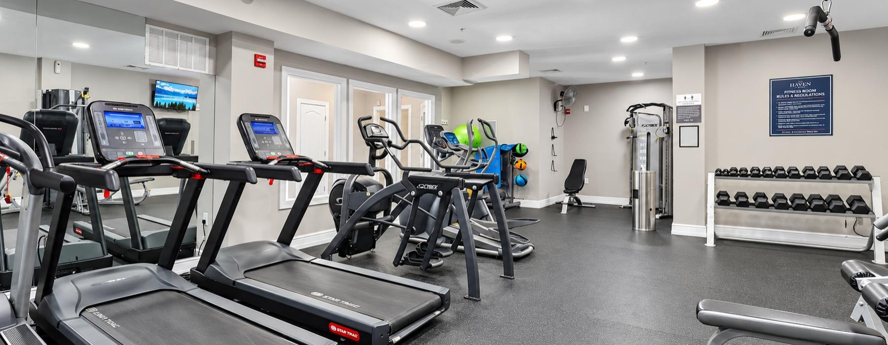 a gym with treadmills