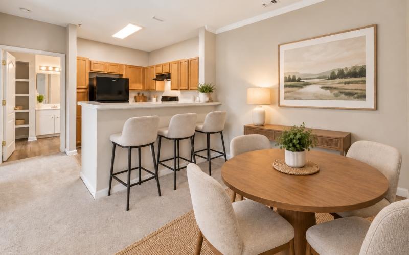 a large kitchen with a dining table