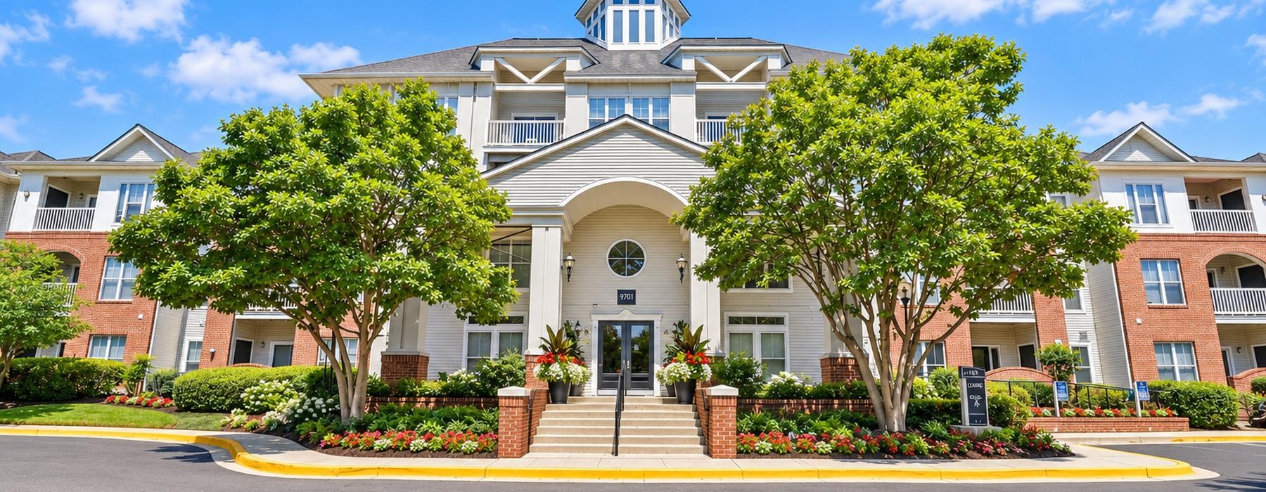 a large building with trees in front of it